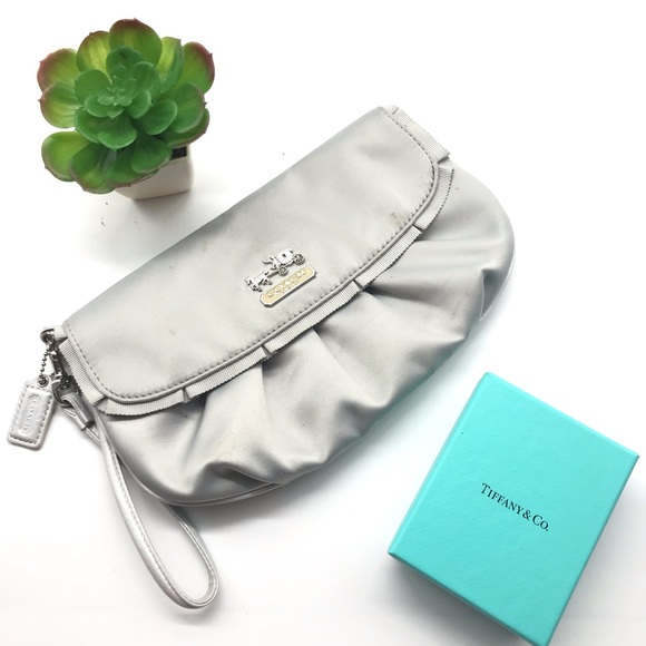 Coach Handbags - Silver Coach Horse and carriage Wristlet